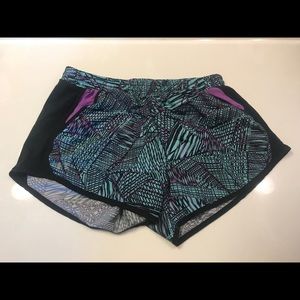 Under Armour blue running shorts